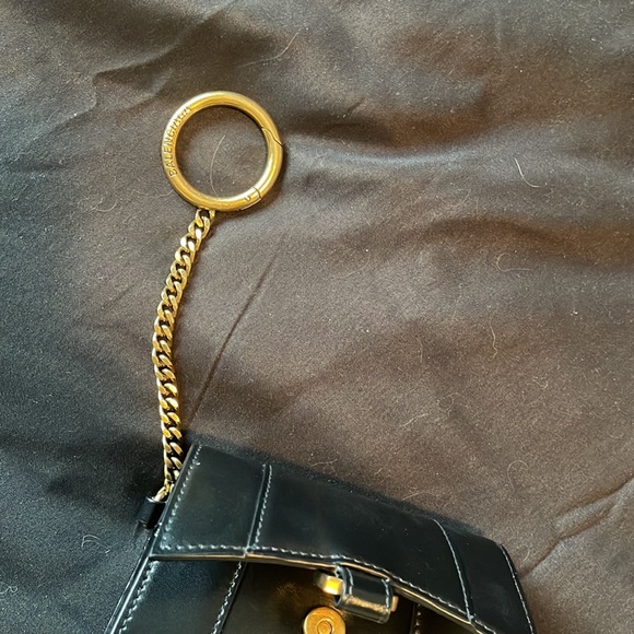 Black leather with a golden chain Balenciaga keychain holder. Side pocket - Picture 2 of 3